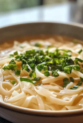 Comforting Savory Ginger Garlic Broth with Rice Noodles Recipe