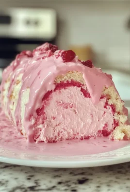 Irresistible Creamy Pink Velvet Cake Roll